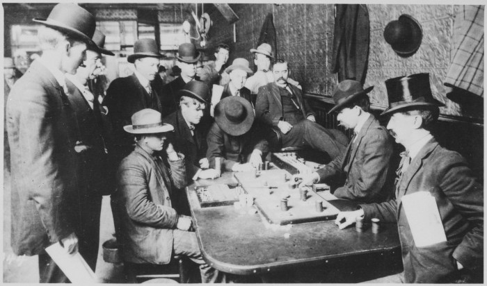 -Orient_Saloon_at_Bisbee,_Arizona..._Faro_game_in_full_blast._Recognized,_Left_to_right-Tony_Downs_(standing_with_derby)_-_NARA_-_530986